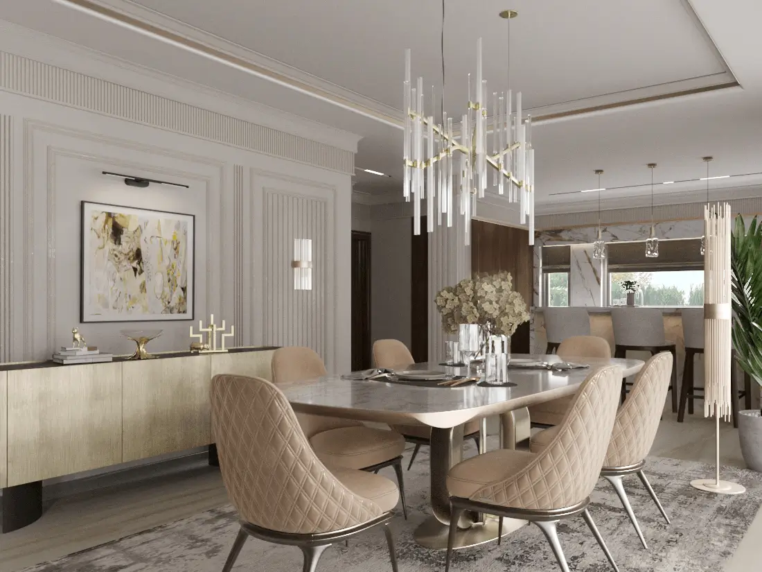Luxury dining room with a marble table, quilted beige chairs, modern crystal chandelier, and elegant wall paneling.